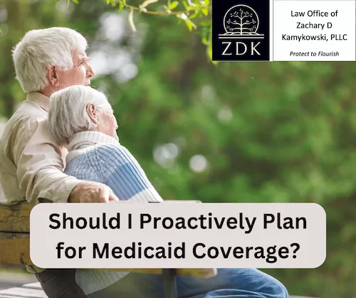 elderly couple on a bench: Should I Proactively Plan for Medicaid Coverage