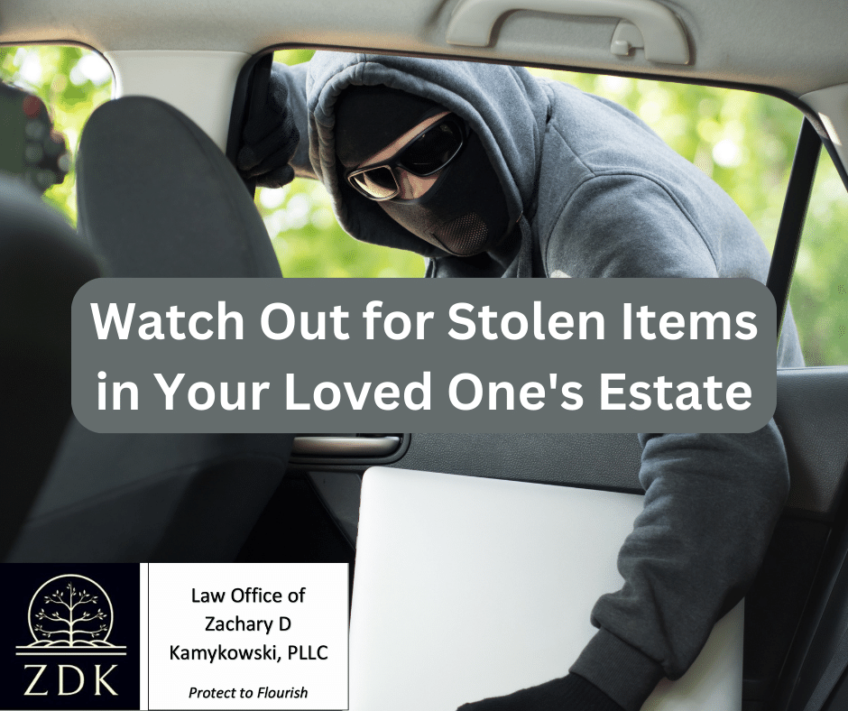 A Thief stealing a laptop from the back of a car: Watch Out for Stolen Items in Your Loved One's Estate